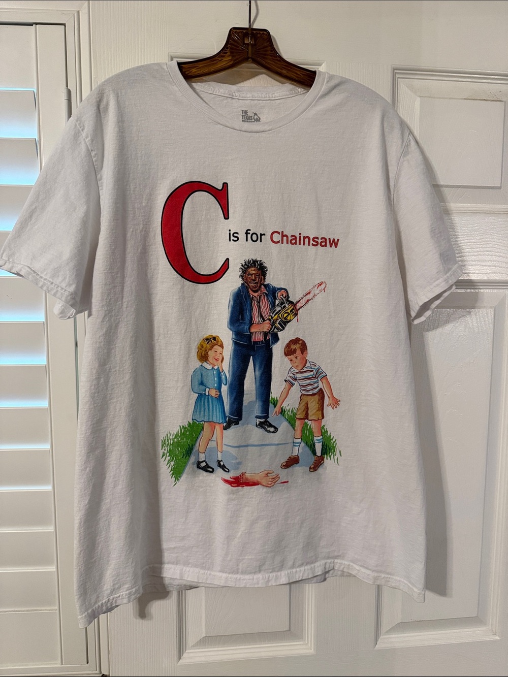 White 'C is for Chainsaw'  Short Sleeve Tee— ‘leatherface’ character- horror